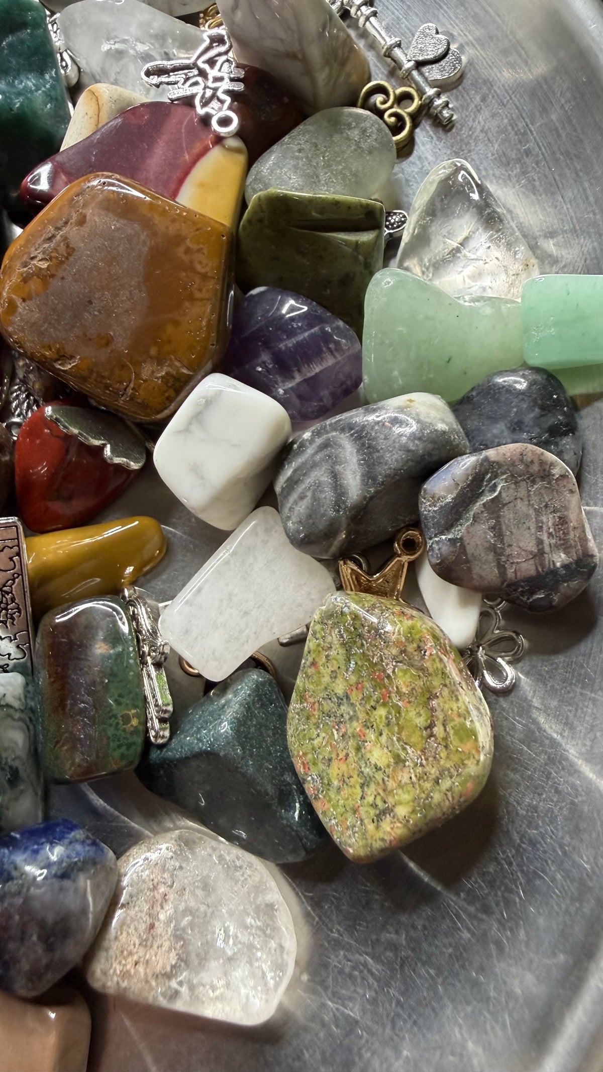 1 lb of Crystals and Charms together and a crystal bracelet