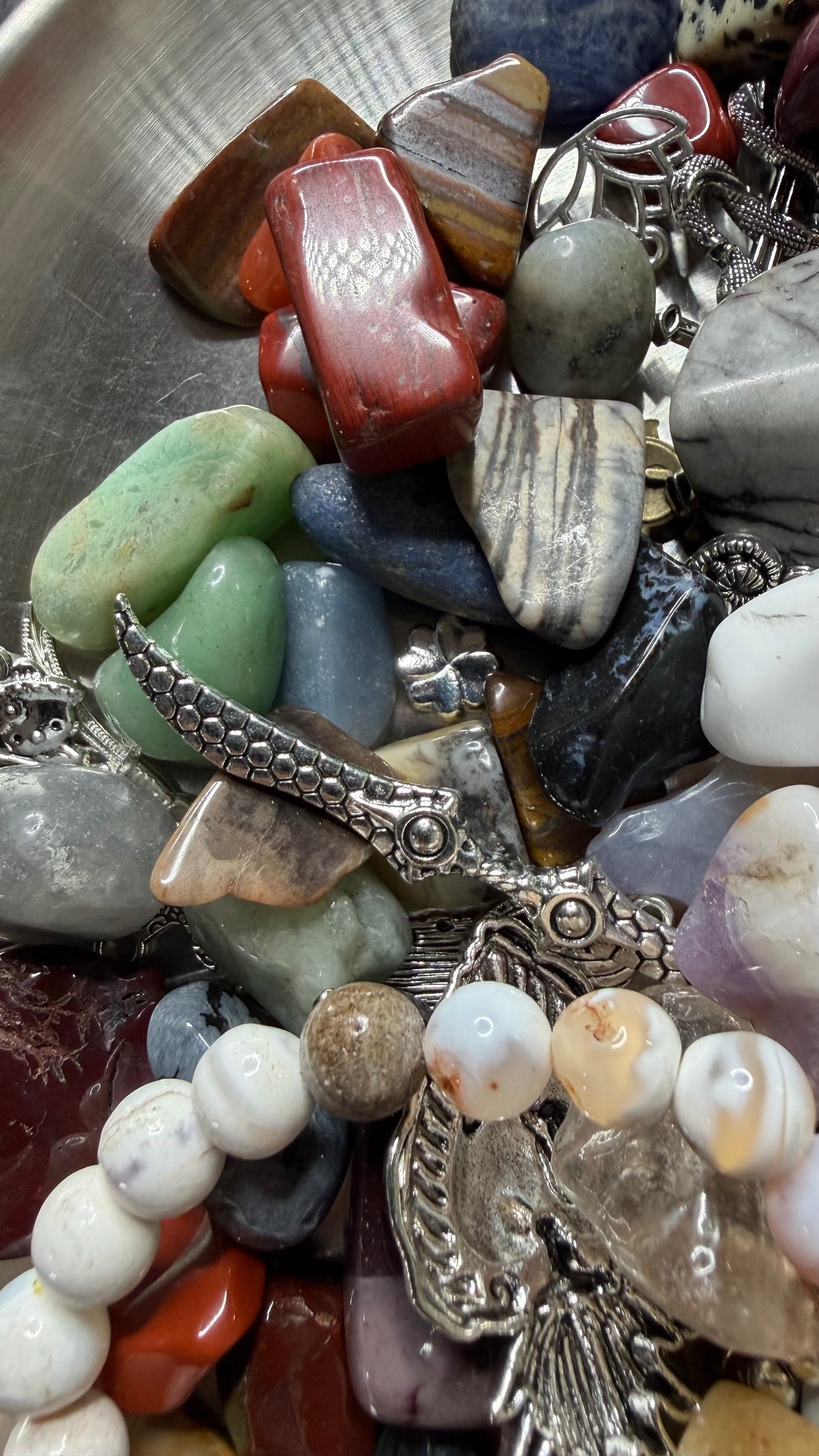 1 lb of Crystals and Charms together and a crystal bracelet