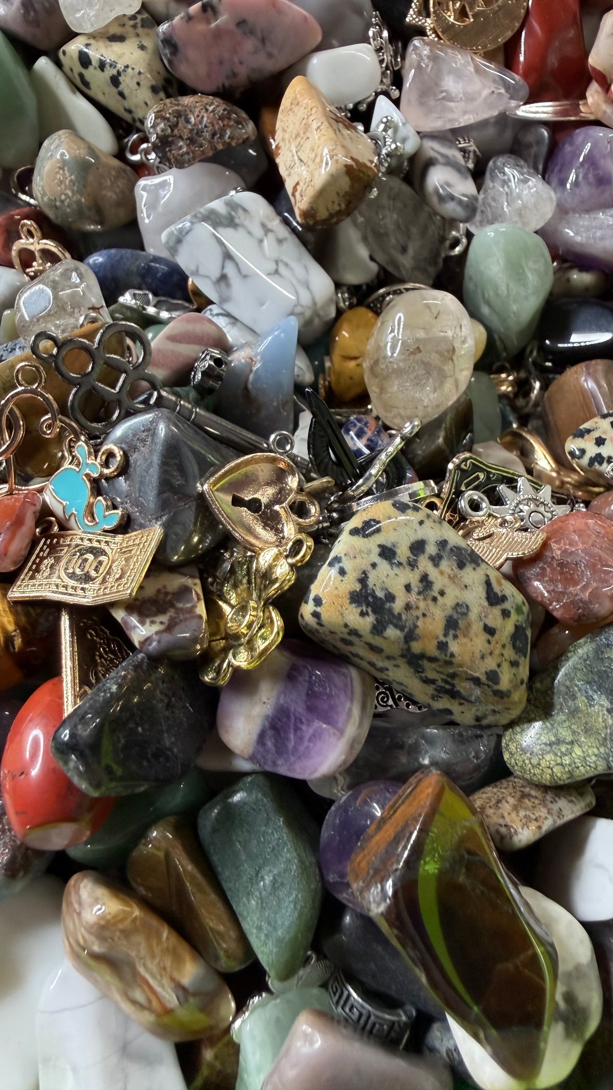 1 lb of Crystals and Charms together and a crystal bracelet